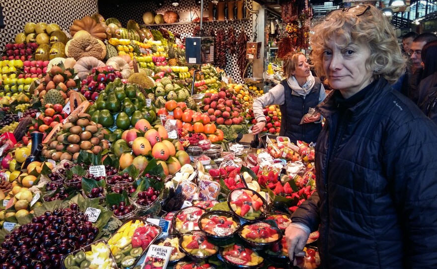 Rocí Gayo, who has sold fruit in Barcelona's La Boquería market for 20 years, says she's fed up with tourists who crowd the market passageways to take photos but don't buy anything. "Out of 20 tourists, if I'm lucky, maybe one will buy one piece of fruit — but no more," she says.