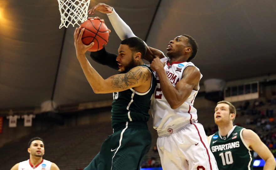 Oklahoma's Buddy Hield, right, and Denzel Valentine of Michigan State played in Friday's East Regional Semifinal of the 2015 NCAA tournament in Syracuse. If you've got money riding on this year's NCAA tournament, you might want to hear about what happened to John Bovary's football pool.