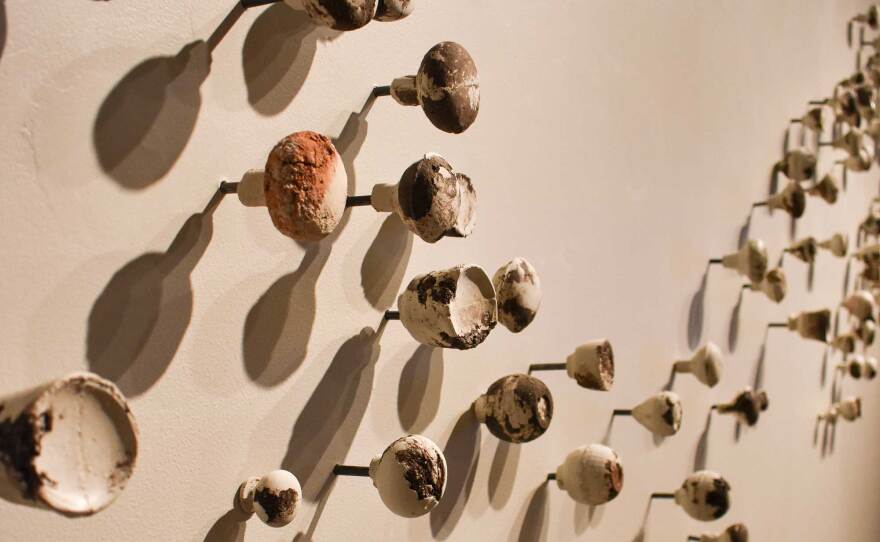 San Diego artist Kline Swonger's sculptural installation, "A Place Called Home" includes 117 door knobs. It's part of the exhibition "Four Visions: A Celebration of the Year of the Woman," on the walls of the currently-closed Cannon Gallery in Carlsbad.
