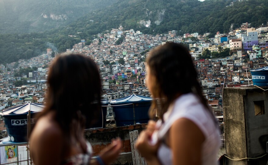 What's up on the roof: Milena and Lala hang out on the rooftop of Milena's house in the Rocinha favela.