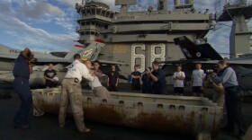 A sailor is baptized aboard the "USS Nimitz." "Carrier," a 10-part series filmed aboard the "USS Nimitz," is a character-driven immersion in the high-stakes world of a nuclear aircraft carrier.