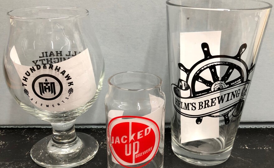 This glassware from the "Brewchive" is a sample of the different shapes of glassware used at local breweries.