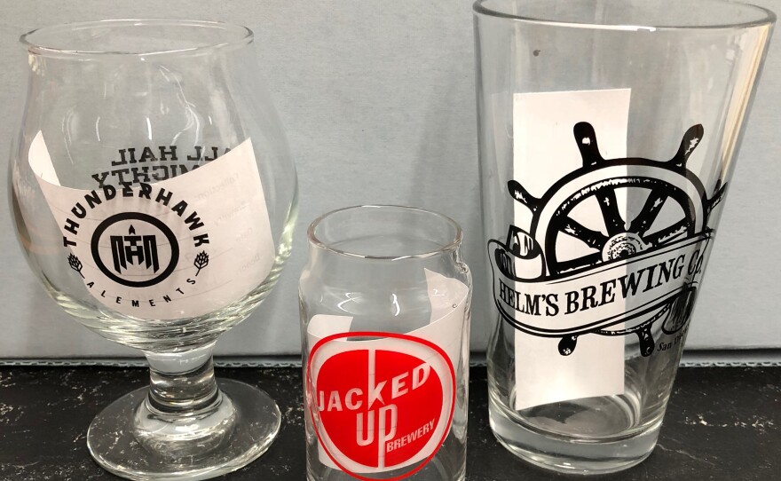 This glassware from the "Brewchive" is a sample of the different shapes of glassware used at local breweries.