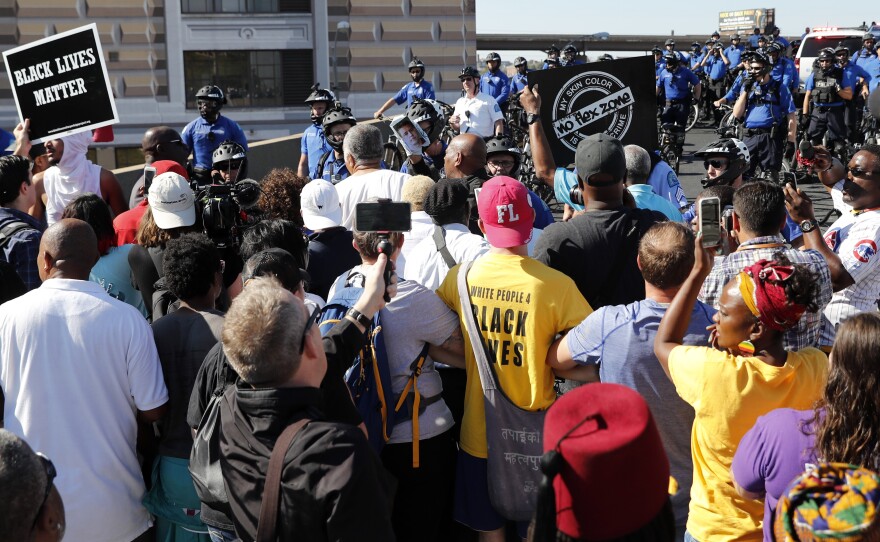 Protesters gather outside the courthouse in downtown St. Louis on Friday, after a judge found a white former St. Louis police officer, Jason Stockley, not guilty of first-degree murder in the death of a black man, Anthony Lamar Smith, who was shot after a high-speed chase in 2011.