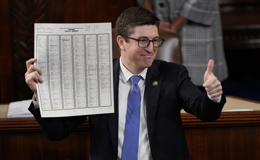 Rep. Bryan Steil, (R-Wis.), holds up the tally sheet in the House chamber after Rep. Kevin McCarthy, (R-CA), was elected as speaker.