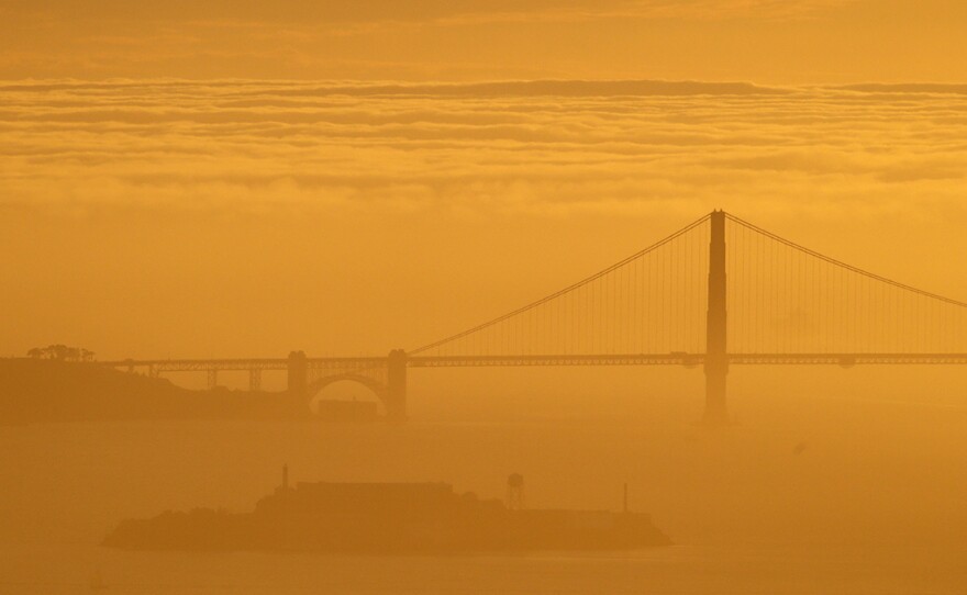 A sea of fog advances on the Golden Gate Bridge during a late winter twilight in 2016. On Saturday the operators of FogCam said the long-running webcam at San Francisco State University will sunset "forever" at the end of August.