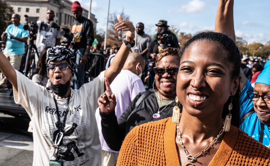 Rally 4 Reparations attendees work to raise awareness about reparations.