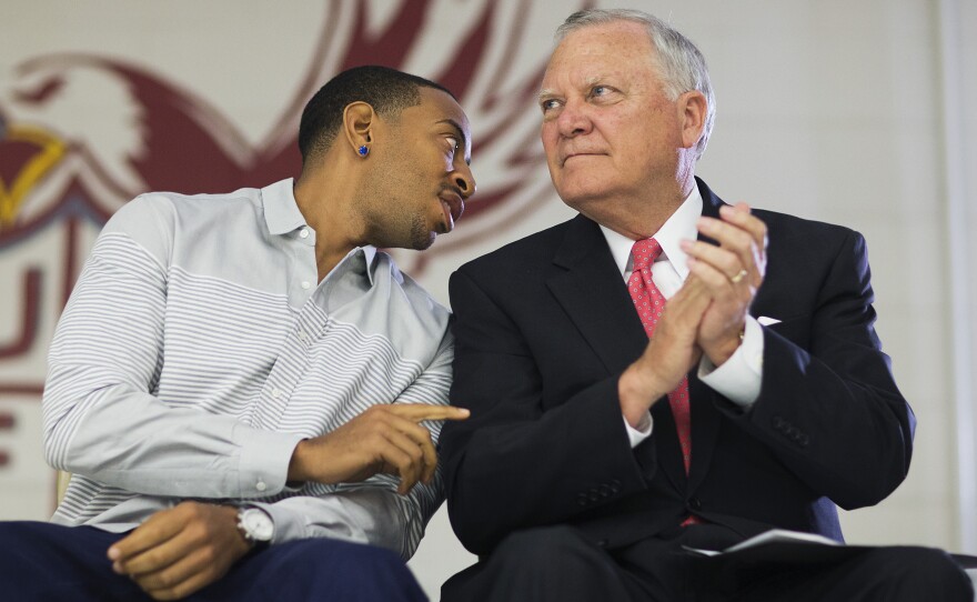 Republican Gov. Nathan Deal visits a charter school in Riverdale, Ga., with rapper Ludacris.