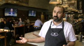Nael Chami stands inside the restaurant he owns downtown, Tapas & Beers, March 12, 2020.
