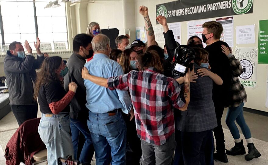 Starbucks employees pushing for a union celebrate after the votes are counted at one Buffalo, New York, location on December 9, 2021.