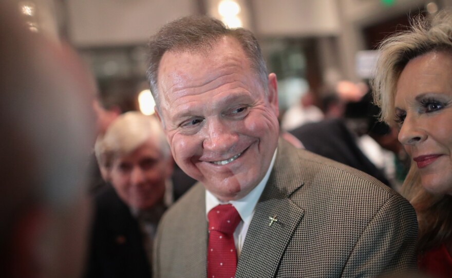 Roy Moore, the Republican candidate for the U.S. Senate in Alabama, is getting a boost from President Trump, who unlike other Republicans is backing his Senate bid despite sexual assault allegations.