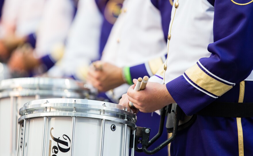 Dozens of members of the University of Washington marching band, shown here in 2017, were transported to hospitals after a bus overturned on Thursday.