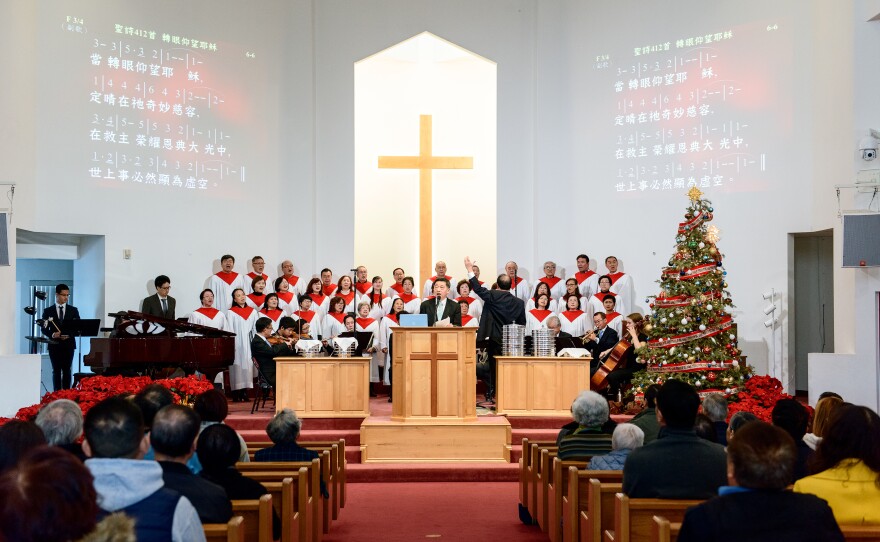 In a scene from "Suburban Chinatown," Church-goers sing hymns during a Chinese-speaking service at Rowland Heights Christian Community Church.
