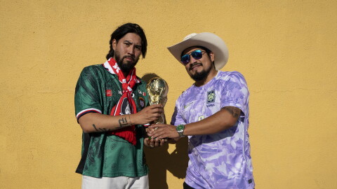 Josh Lee and Fernando Delgado hold a fake trophy outside the Biergarten in Los Angeles' Koreatown before the South Korea vs. Czech Republic World Cup game on June 11.