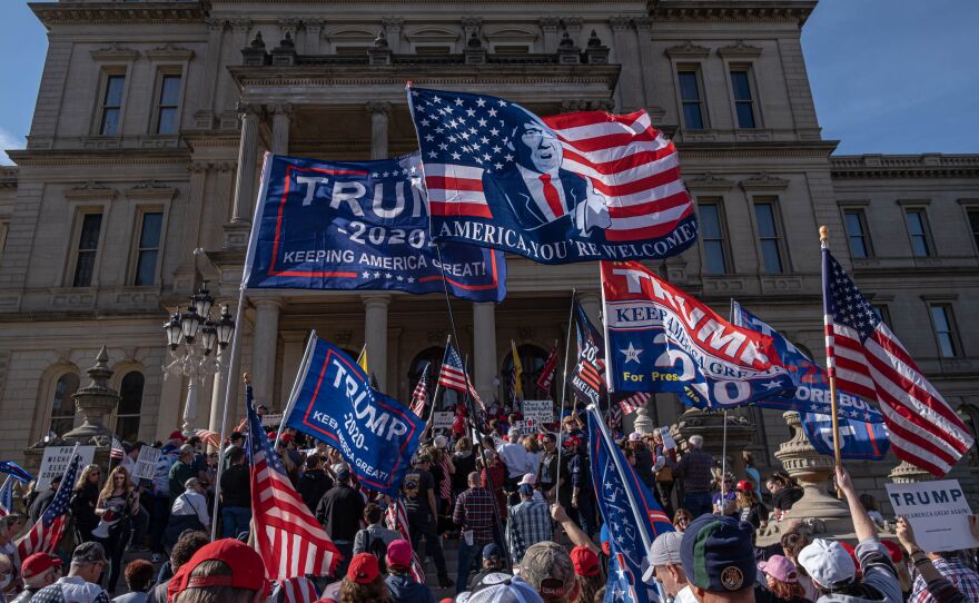 LANSING: Supporters of US President Donald Trump rally at the State Capitol in Lansing, Michigan, on November 7, 2020, after Democratic Presidential nominee Joe Biden was declared the winner of the 2020 US elections.
