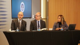 Matt Pearce, director of policy at Rebuild Local News, Andy Russell, president and CEO of PBS SoCal, and Jennifer Ferro, president of KCRW speak at an informational hearing of the