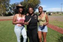 Jazzay Buncom, Diamond Brandon and Lucie Cishugi (left to right) hold red burgundy okra and black-eyed pea seeds at S&S Friendly Ranch on Feb. 27, 2026.