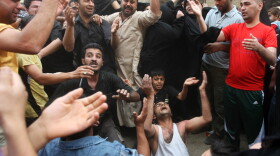 Family members mourn Wednesday at the funeral of a victim killed in a bomb attack in Baghdad's Alawi district, a day after six bombs in the capital killed at least 35 people. The outburst of violence is intensifying fears that insurgents are making a return after a postelection political impasse.