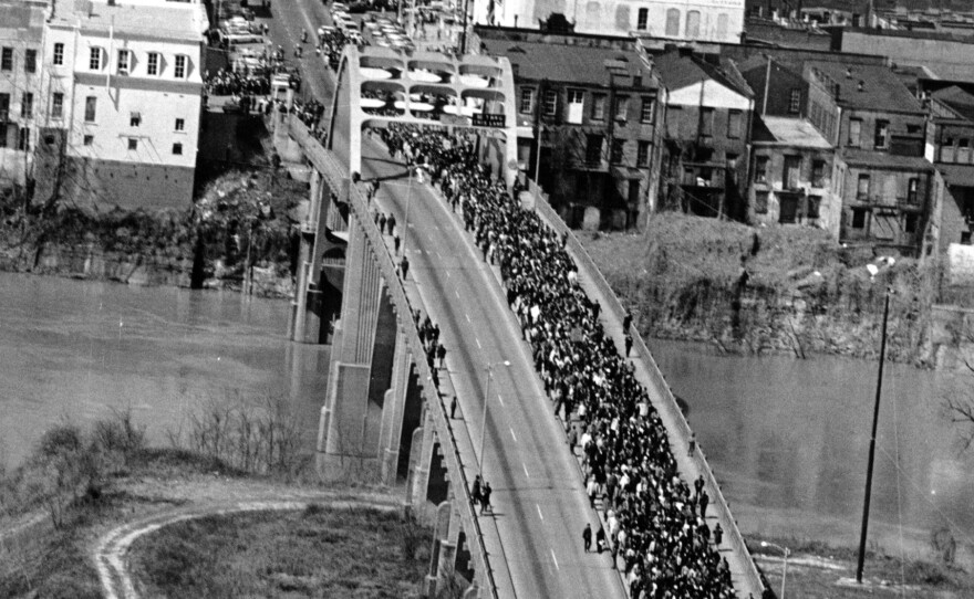 In this March 21, 1965, file photo, civil rights marchers cross the Alabama River on the Edmund Pettus Bridge in Selma, Ala., toward the State Capitol of Montgomery.