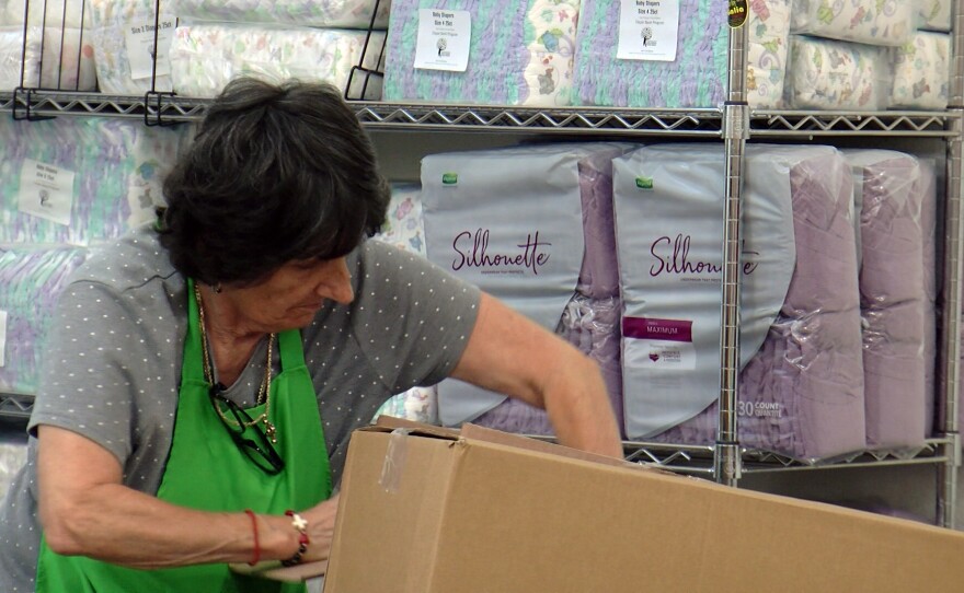 A San Diego Food Bank worker stocking diapers for the Diaper Bank, March 15, 2024.