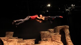 Actors in Lamb's Players' production of "The Book of the Dun Cow" work on a fight scene during tech rehearsal.