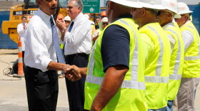 President Obama meets construction workers after speaking at the groundbreaking of a road improvement project funded by economic stimulus money in Columbus, Ohio, on Friday.