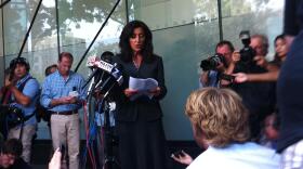 Attorney Lisa Damiani reads a statement from the Holmes family about 24-year-old James Holmes, accused of killing 12 and injuring 58 in a mass shooting at a Colorado movie theater.