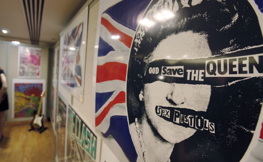 A promotional poster for the 1977 single God Save The Queen by the Sex Pistols on display, during a photo-op ahead of a rock and pop memorabilia auction, in central London, Thursday June 25, 2009.