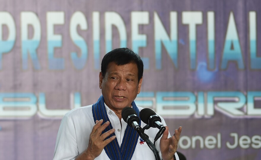 Philippine President Rodrigo Duterte delivers a speech at an air base in Manila on Tuesday.