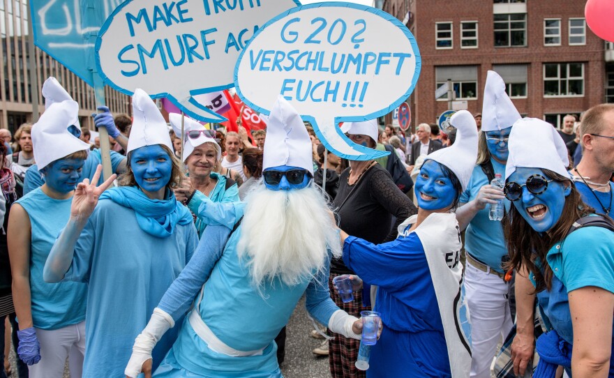 Pro-Smurf demonstrators are seen at Saturday's "Grenzenlose Solidaritaet" ("unlimited solidarity") protest march in Hamburg, Germany.