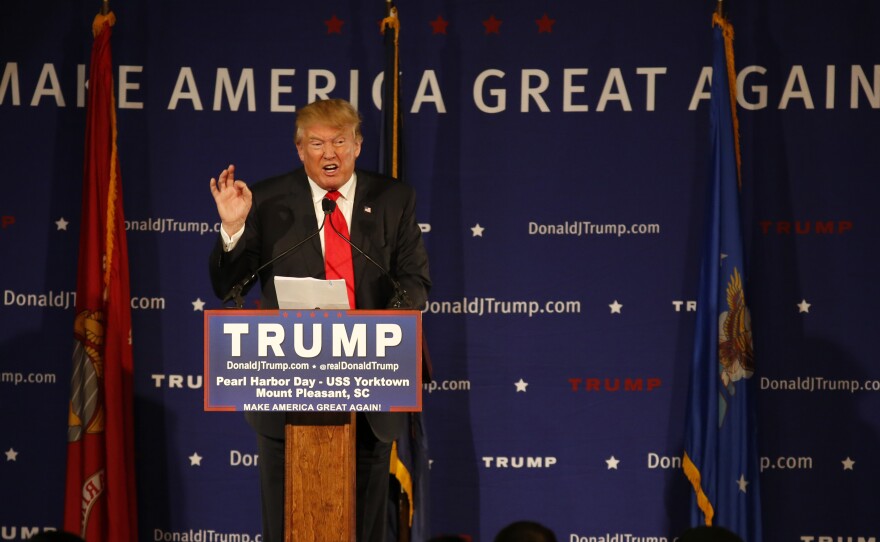 Republican presidential candidate and businessman Donald Trump speaks during a rally coinciding with Pearl Harbor Day at Patriots Point aboard the aircraft carrier USS Yorktown in Mount Pleasant, S.C.