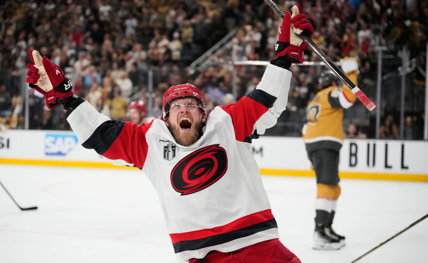 Carolina Hurricanes left wing Nikolaj Ehlers (27) celebrates after scoring an empty-net goal during the third period in Game 6 of the NHL hockey Stanley Cup Final series against the Vegas Golden Knights, Sunday, June 14, 2026, in Las Vegas.