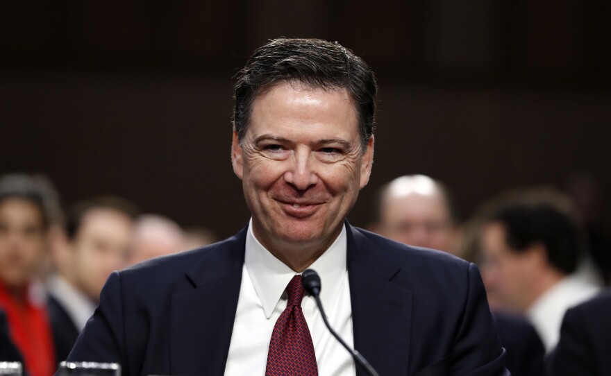 Former FBI Director James Comey, who re-emerged on the public stage Monday through Twitter, appears at a Senate Intelligence Committee hearing on Capitol Hill in June.