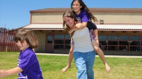 A mother serving time in a California prison spends the day with her children as part of the state department of correction's "Get On The Bus" program.  Photo taken July 2009.