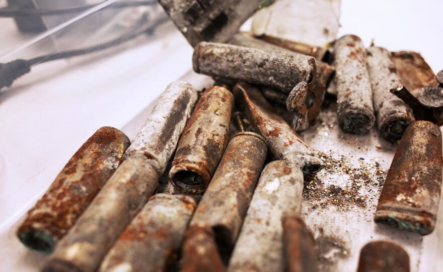 When lithium-ion batteries overheat, the fluid inside the cells can catch fire. These are the remnants of a battery pack from a "hoverboard" scooter.