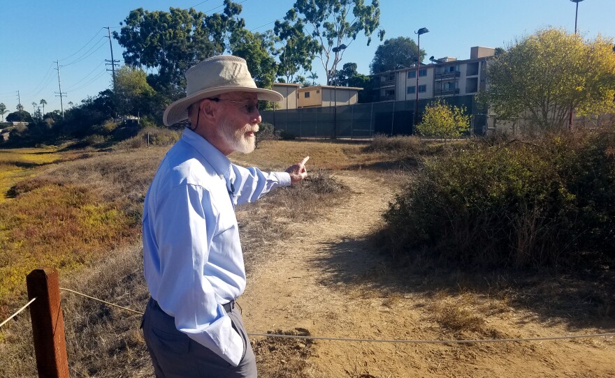 Jim Peugh walks the trails in the Famosa Slough in Point Loma, Nov. 1, 2019.