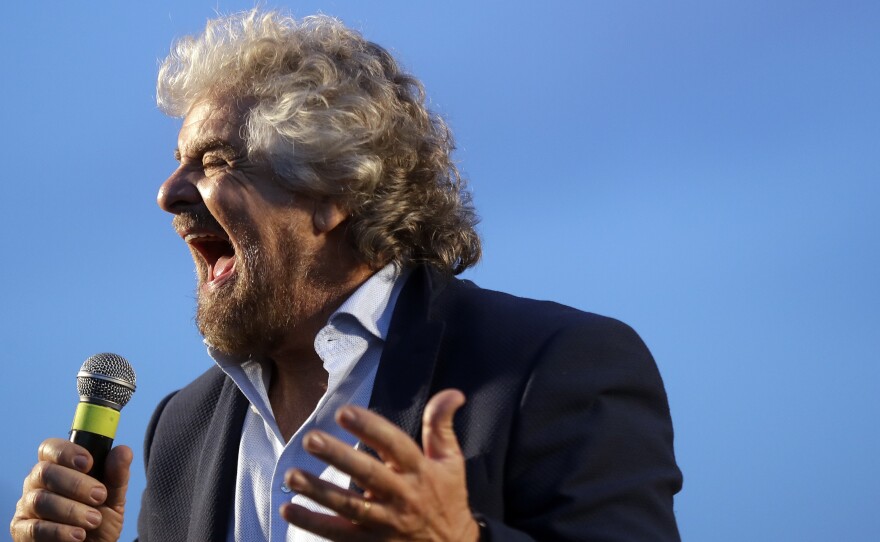 The leader of Italy's opposition Five-Star Movement, Beppe Grillo, calls for a "no" vote in Sunday's referendum at a Nov. 26 rally.