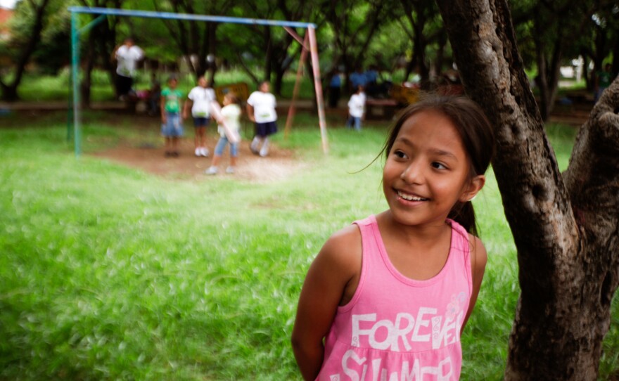 A girl in a park in Managua, Nicaragua. The country topped the list for gains in happiness.