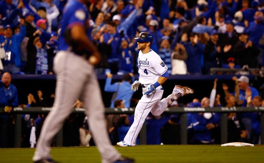 Alex Gordon of the Kansas City Royals runs the bases after hitting a solo home run in the ninth inning Tuesday night, tying the game.