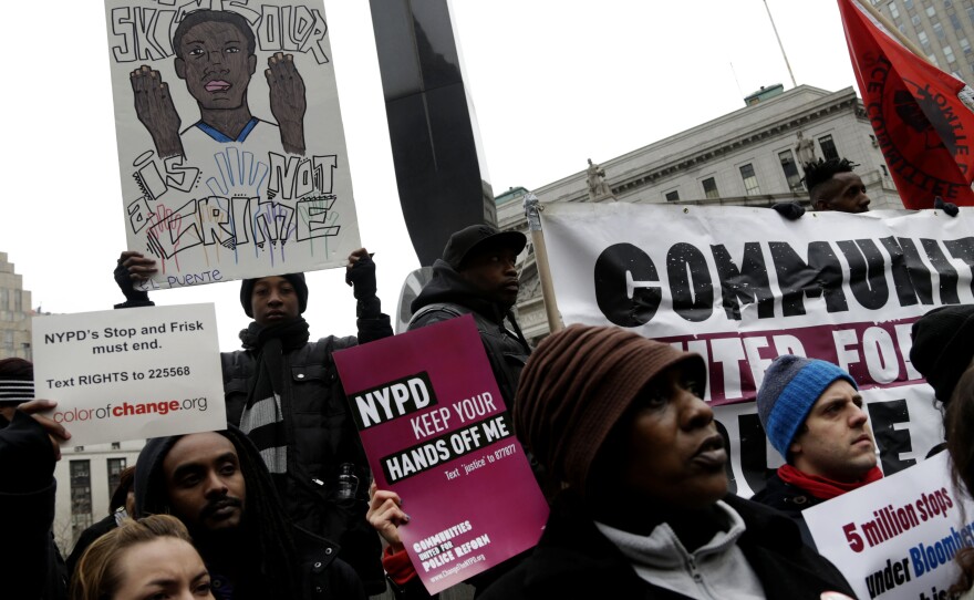 Protesters participate in a rally near the federal courthouse March 18 in New York. Lawyers for four men who say they were illegally stopped said many of the 5 million people stopped, questioned and sometimes frisked by police in the past decade were wrongly targeted because of their race.