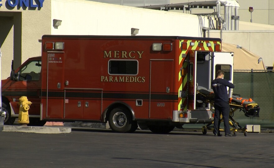 A patient is taken out of an ambulance at Sharp Chula Vista Medical Center, Dec. 16, 2020.