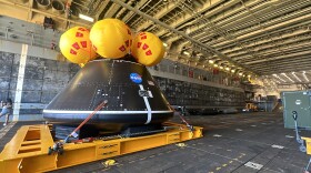 A mock-up of the Orion spacecraft on the deck of the amphibious transport dock John P. Murtha, Aug. 2, 2023. 
