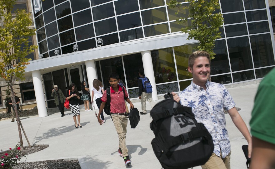 Students leave school at the end of the day at the Global Impact STEM Academy.