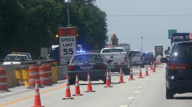 Traffic moves around road construction work on Interstate 93 in Hookset, N.H., last summer. New Hampshire highways are just one of the places where some $100 million in stimulus funds are being spent in the Granite State.