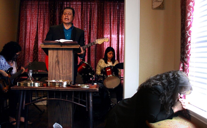 Perez's family runs a Spanish-language Pentecostal church out of their home. Perez (left) plays bass in her father's praise band.