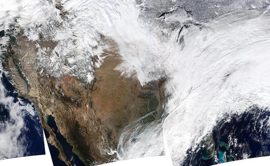 A composite image shows large portions of the United States covered by snow, as a winter storm moved eastward across the country. The photographs were taken on Jan. 2.