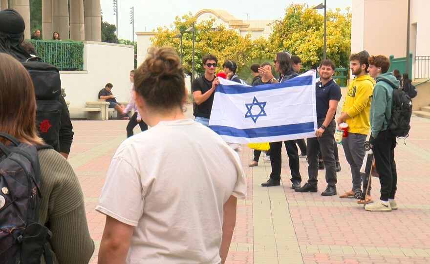 A small group of Israeli students show support for their home country, Wednesday, on the campus of San Diego State University, San Diego, Calif., October 25, 2023