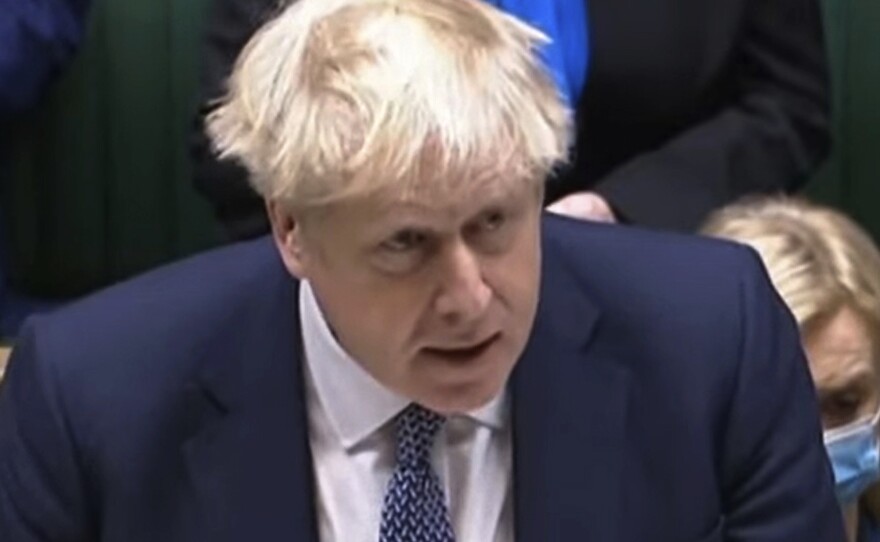 In this grab taken from video, Britain's Prime Minister Boris Johnson makes a statement ahead of Prime Minister's Questions in the House of Commons, London, Wednesday, Jan. 12, 2022.