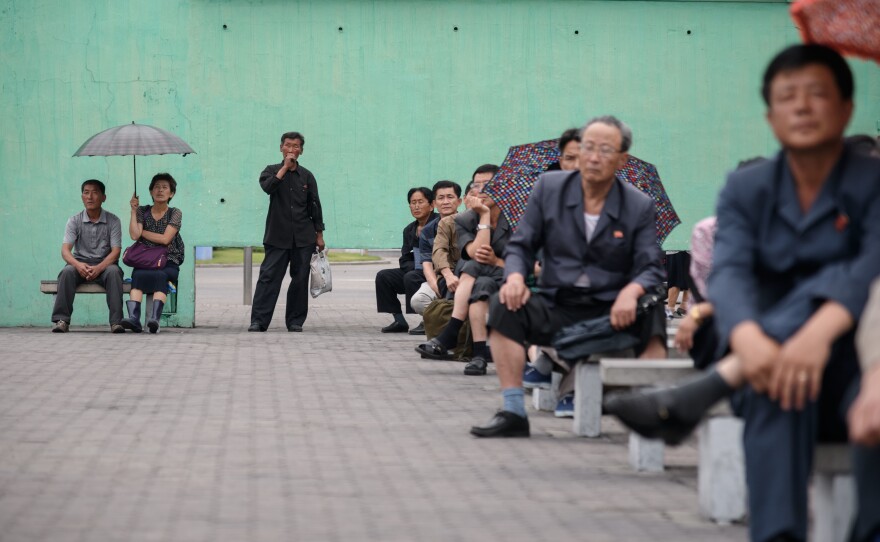 North Korean viewers watch a giant television screen outside the central railway station in Pyongyang, which was broadcasting news of the Singapore summit last month between Kim Jong Un and President Trump.