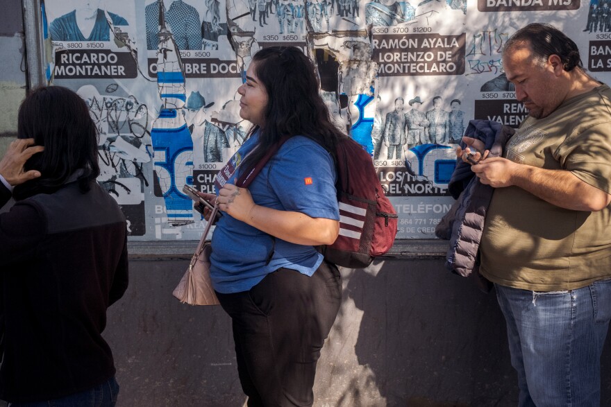 Camila, a worker at a McDonalds in San Diego, says she usually waits about an hour and a half in line to walk across the San Ysidro Port of Entry, Nov. 3, 2021.